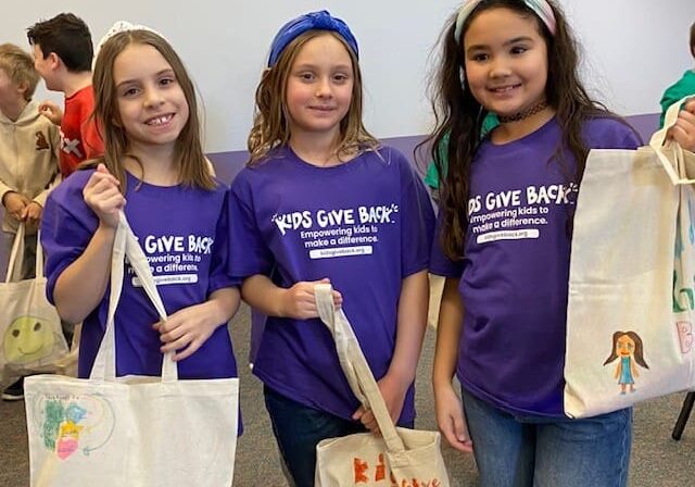 Girls with tote bags Girls at camp